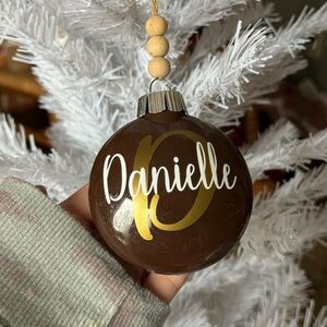 Festive Brown Ornament with Gold Accents